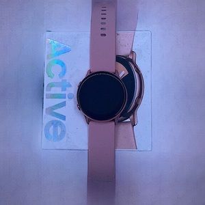 Samsung Watch Active. Rose gold. Pink watch band. Very good quality.